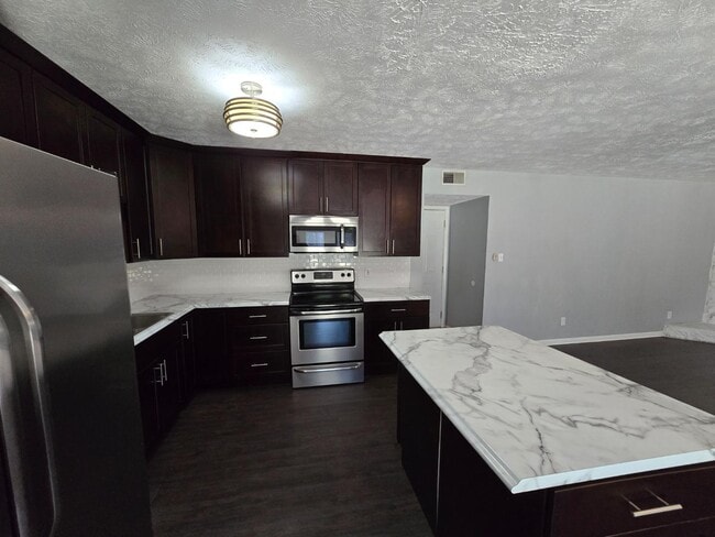 Building Photo - 6911 Wickersham Rd