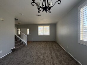 Building Photo - 4 Bedroom with NEW Carpet & Paint