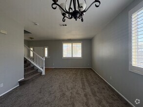 Building Photo - 4 Bedroom with NEW Carpet & Paint