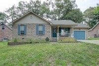 Building Photo - Amazing Brick Front Ranch Style Home With Open Floorplan, Brick Front Fireplace and Stainless App...