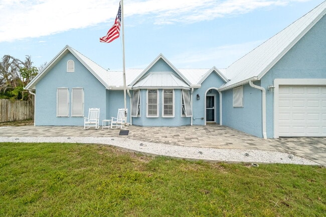 Building Photo - 4BR/2.5BA in gorgeous Melbourne Beach!