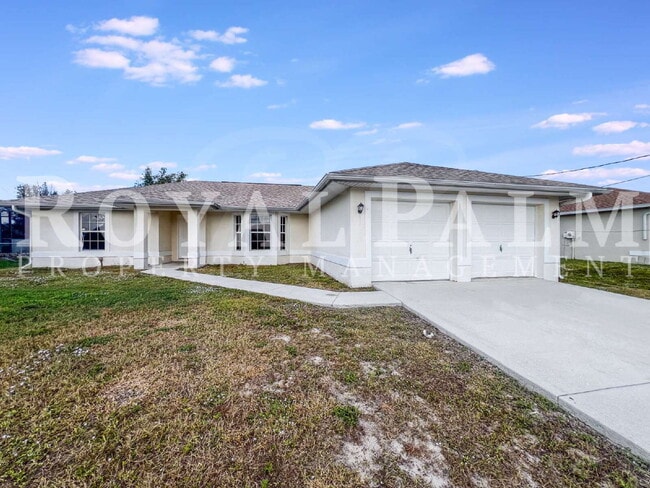 Building Photo - New Year, New House? 3BR/2BA Lehigh Acres Home with Garage, Lawn Care, and Big Main Character Energy