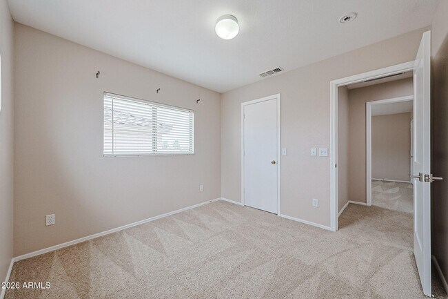Building Photo - 15569 W Gelding Dr