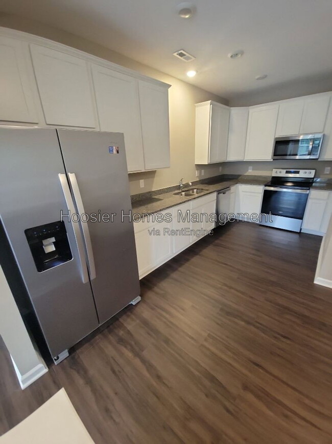 Building Photo - 5636 Brownstone Dr