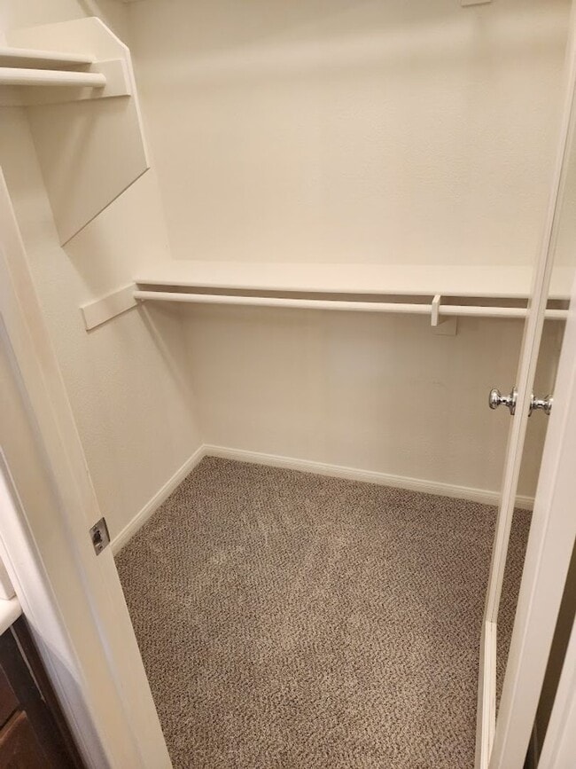 Building Photo - Two Story 3 Bedroom Townhome with 2 Car Garage in Gated Community