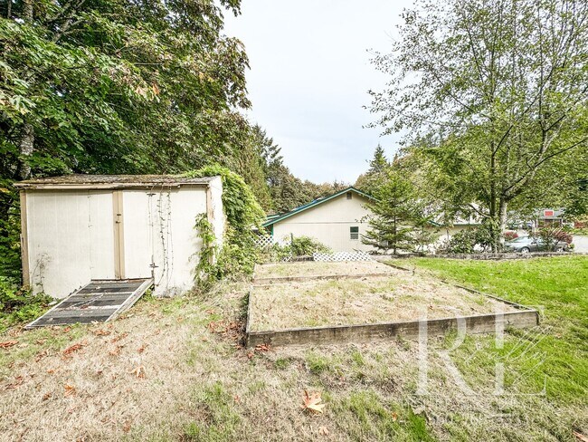 Building Photo - Your Charming Rustic Retreat- 3 Bedroom With Wrap-A-Round Yard