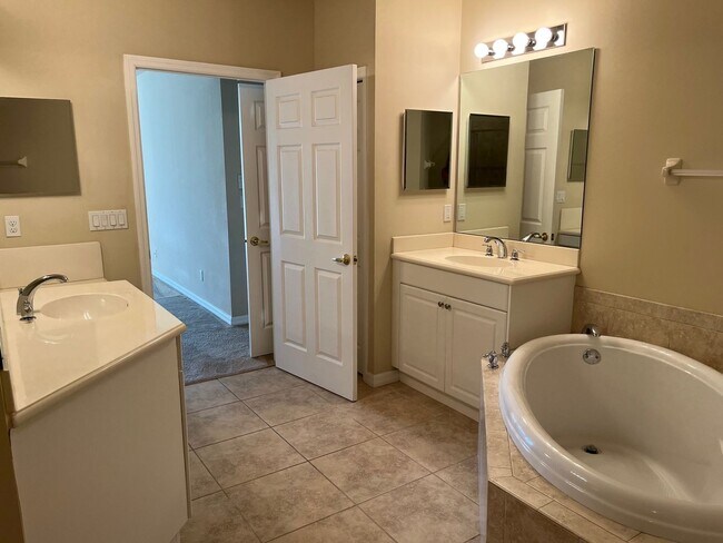 Building Photo - Meadows of Estero 1st floor unit with 2 car garage