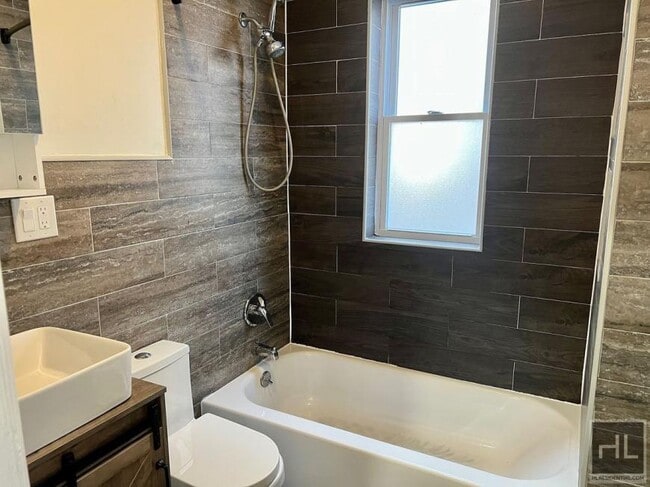 Building Photo - 4 bedroom in BROOKLYN NY 11207