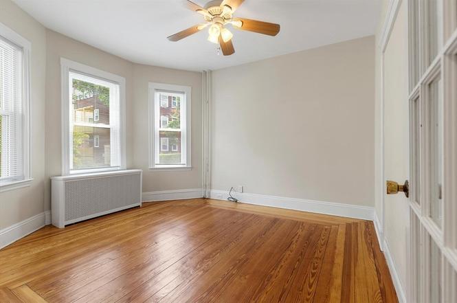 Available bedroom. Largest on floor. Tons of light! - 45 Calvin St