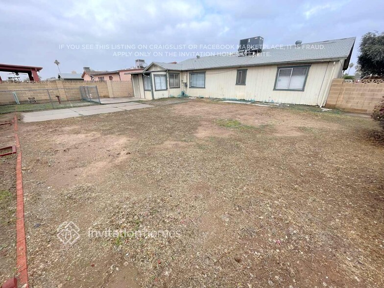 Building Photo - 8435 W Amelia Ave