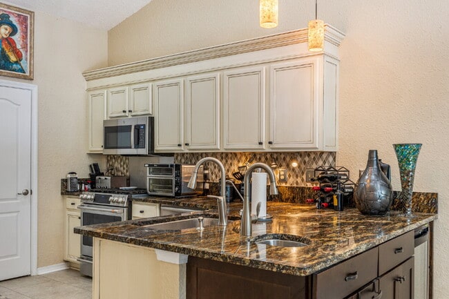 Building Photo - "Coastal Elegance Awaits: Spacious 4-Bed Oasis with Granite Touches on Shipwreck Road"