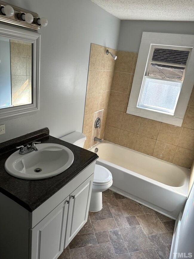 Building Photo - Your Own Home and Yard Centrally Located 3...