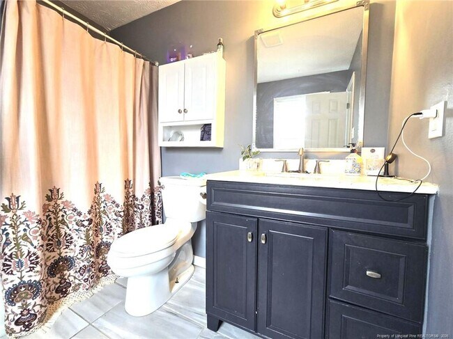 Building Photo - 6873 Brasswood Dr