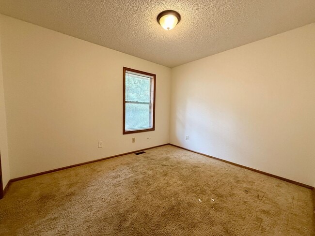 Building Photo - Beautifully Updated 5 Bedroom Rockrimmon Ranch Home Backing to Open Space