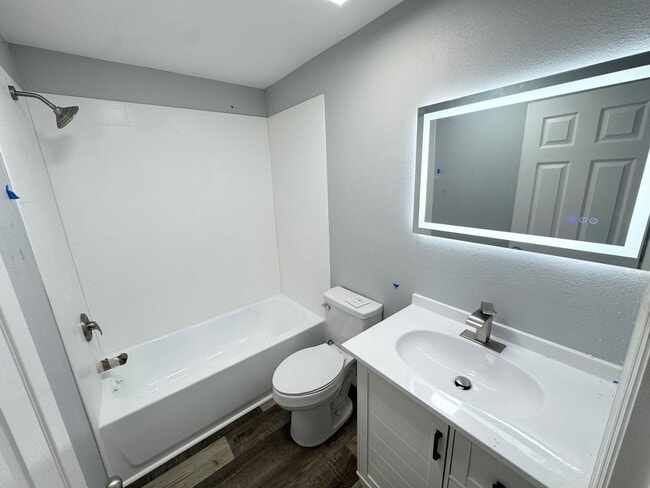 Building Photo - GORGEOUS REMODELED 3BR/2BA Zephyrhills Home with HUGE SCREENED IN PORCH and Shed