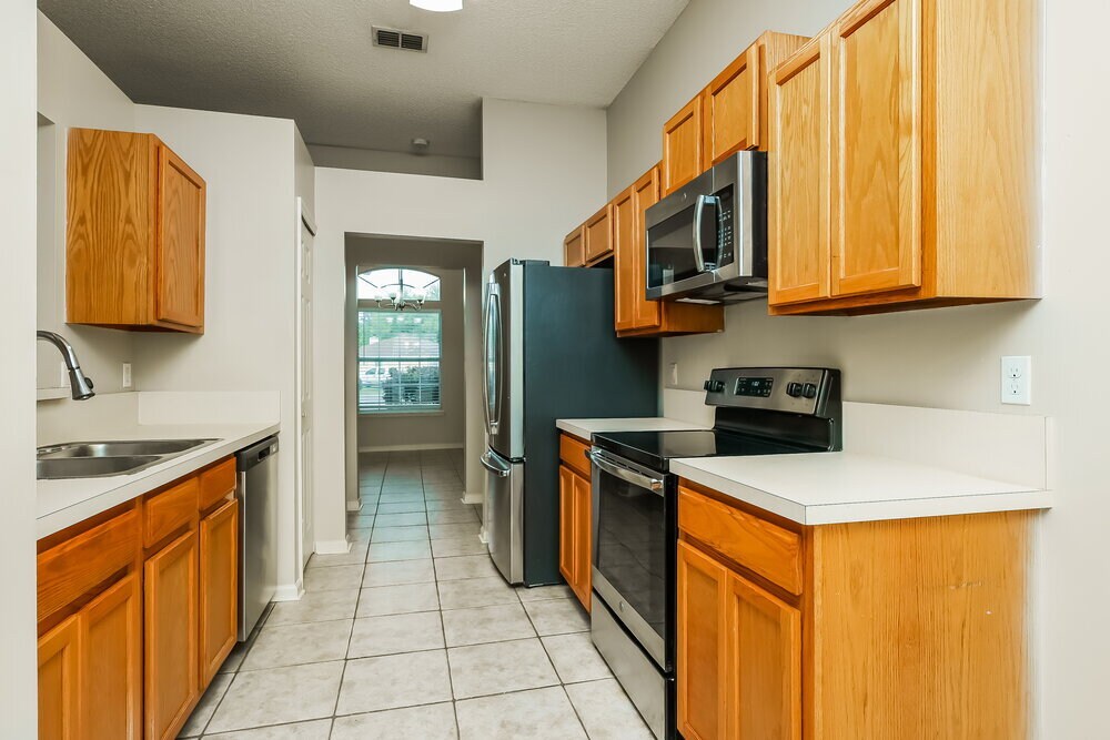 Building Photo - 7811 Invermere Blvd N