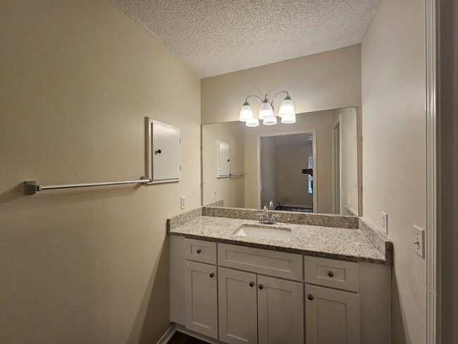 Building Photo - "Charming 2-Bed, 2-Bath Condo with Granite Elegance in Cantonment!"