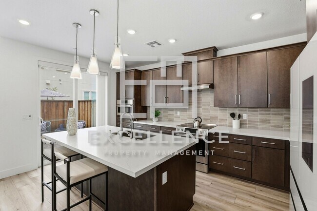 Building Photo - One Year New Home!  3/2.5 With Beautiful Updates Throughout Including Quartz Counters, Water Filt...
