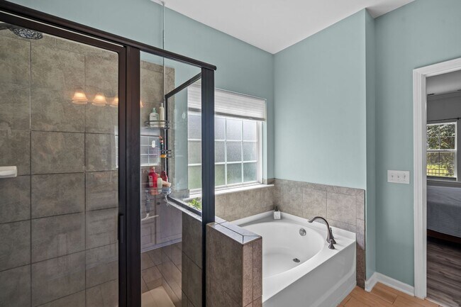 Building Photo - Relax by the Water – 4BR Home with Pond Views in Creekside