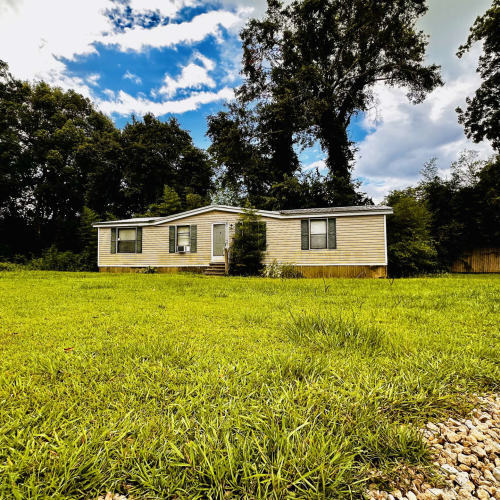 Building Photo - Whispering Pines