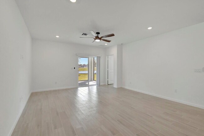 Building Photo - Luxurious Living: Spacious 5-Bedroom Home with Scenic Views in Port Saint Lucie!