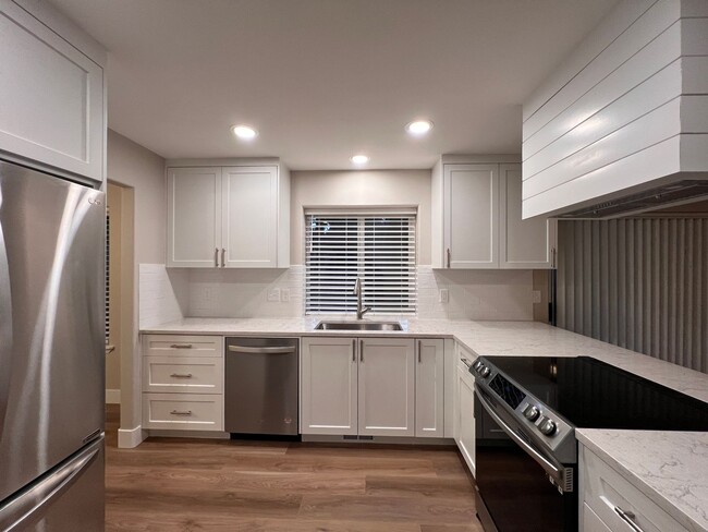 Building Photo - Beautifully Remodeled East Vancouver Two S...