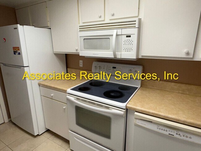 Building Photo - 2-Bedroom Condo with Dual Balconies and PO...