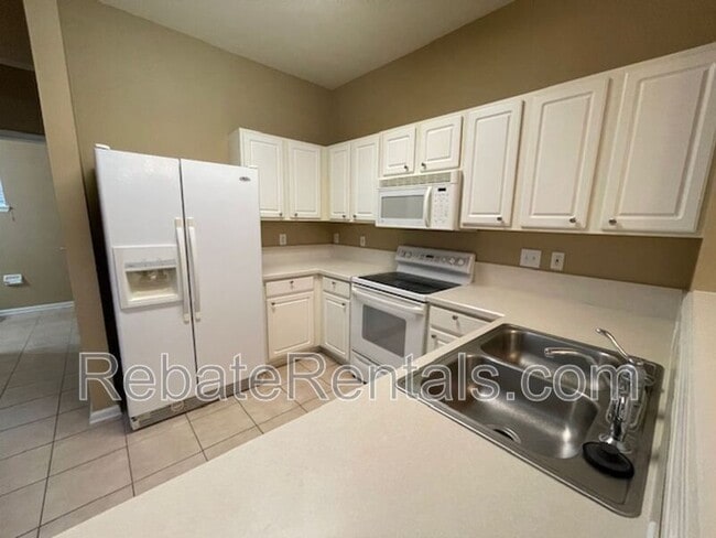 Building Photo - 7478 Scarlet Ibis Ln