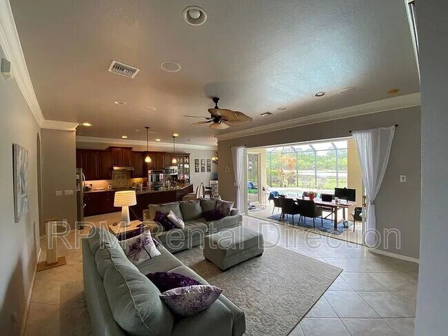 Building Photo - 4-Bedroom W/Den Lakefront Pool Home with Spa in Gated Promenade East at The Forum