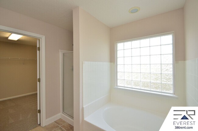 Building Photo - SPACIOUS, FULLY FENCED 4/2.5/2 IN DESIRABLE MATANZAS WOODS