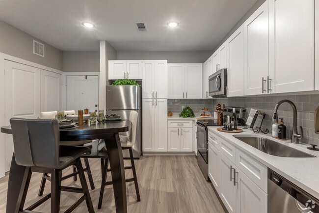 1BR, 1BA - 682SF - Kitchen and Dining Room - Aria at  Ella-(New)