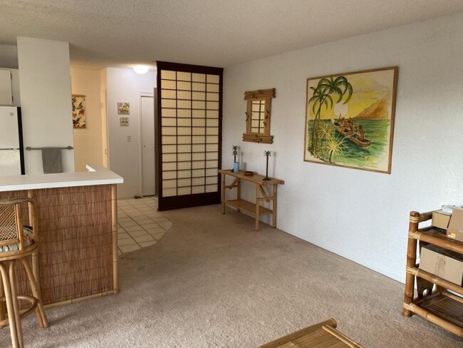 Building Photo - 75-6016 Alii Dr #222