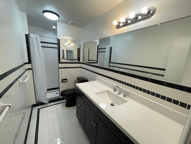 Building Photo - A fully updated Four Bedroom, Three and On...