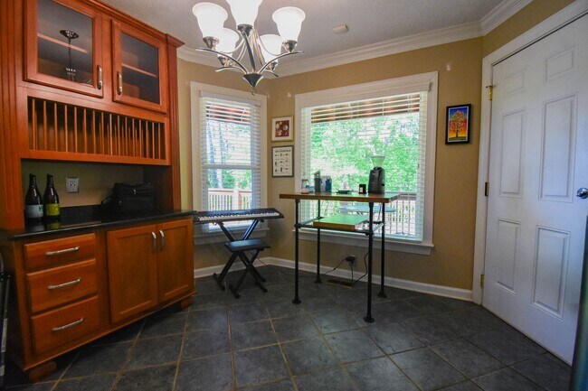 Building Photo - Coming Soon! 4 Bedroom 2.5 Bathroom With A Large Deck and 2 Car Garage! Near Methodist University