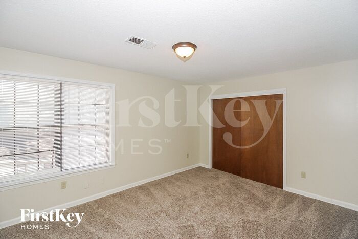 Building Photo - 4965 Gardenwood Dr