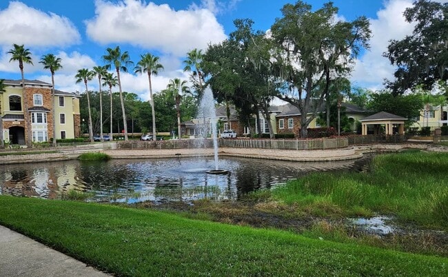 Building Photo - Elegant 1-Bedroom Condo with Lakeside Views in Resort-Style Community