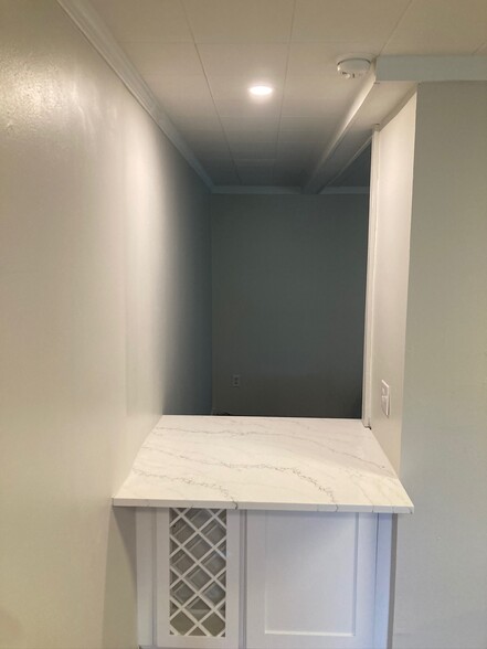 Bar with wine rack - 227 E Hector St