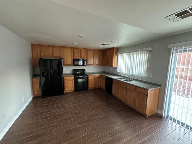 Building Photo - 11588 W Aruba Beach Ave