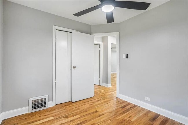 Building Photo - 6411 S Leclaire Ave