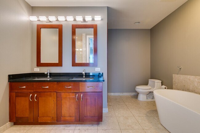 Building Photo - Iconic Strip-View Luxury | Elegant 1BR + Den High-Rise Residence