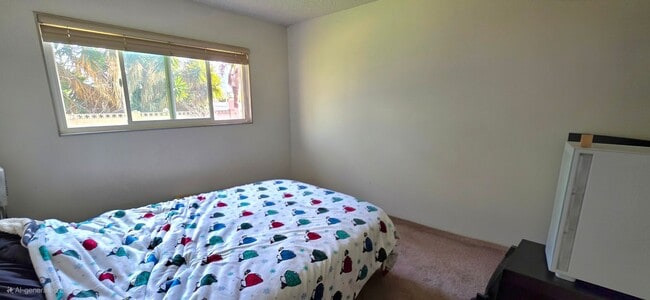 Building Photo - Spacious 4-Bedroom 2 Bath Home with a Large, Serene Backyard and Courtyard.