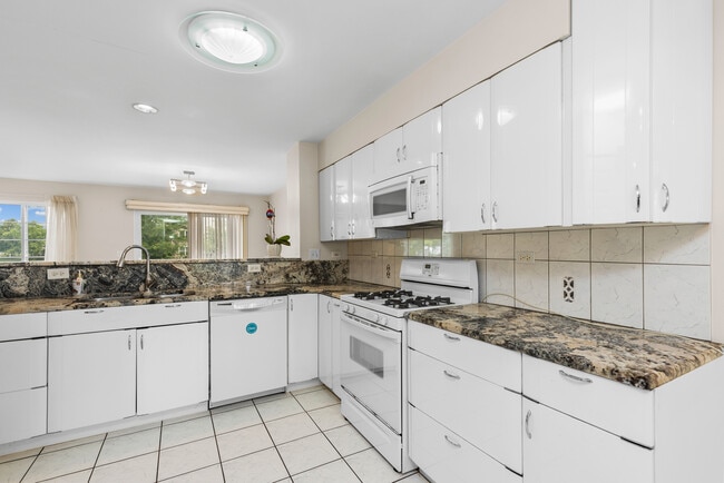 Building Photo - 8966 W Heathwood Cir