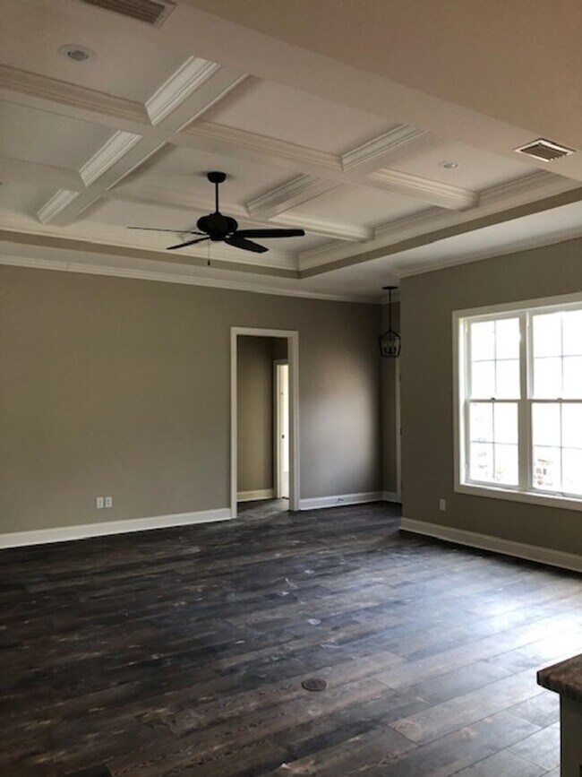 Building Photo - Spacious 4BR/3BA Creekside West Home with Screened Porch, Fenced Yard & 3-Car Garage