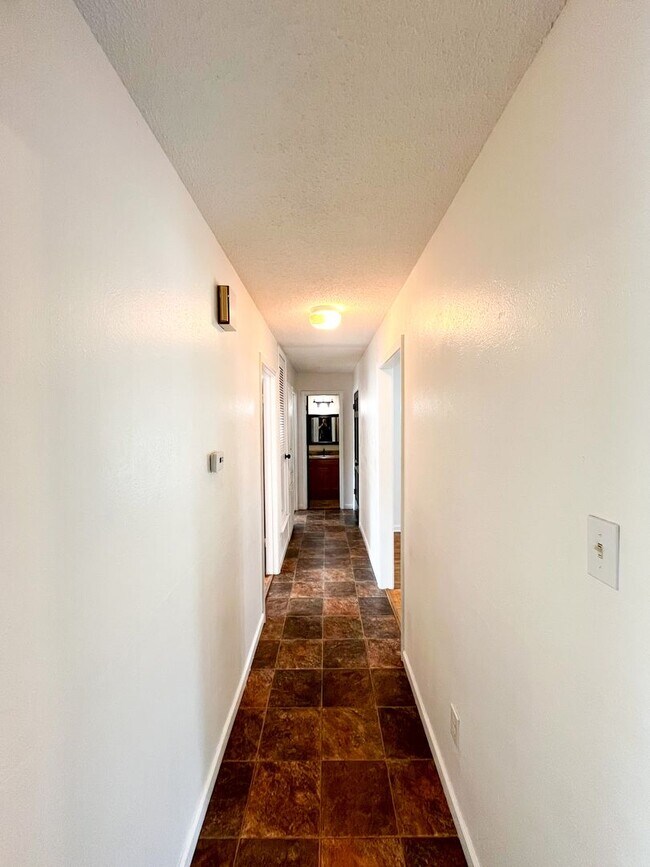 Building Photo - Available Now!!!! Gorgeous 3 bedroom, 2 bath, 2 car garage home. Beautiful wood look flooring. Sp...