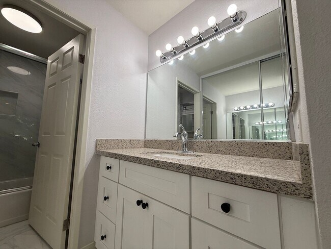 Building Photo - Modern 1-Bedroom Condo with Resort-Style A...