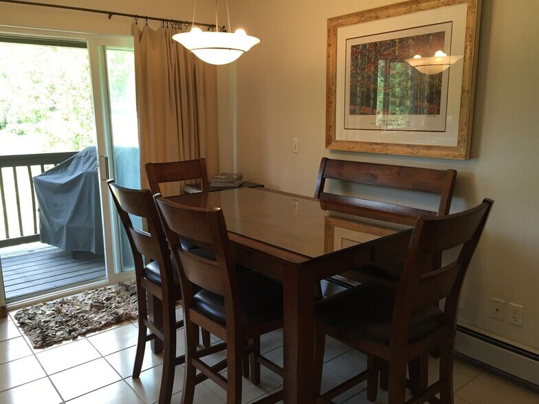 Kitchen table seats 6, deck off kitchen with new grill in 2022 - 103 Morningstar Cir