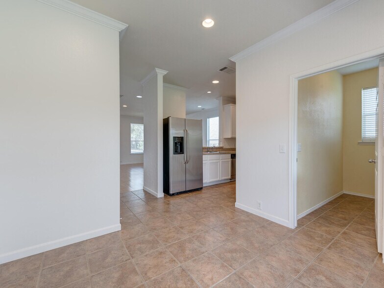 Laundry Room adjacent to kitchen - 10528 Astor Dr