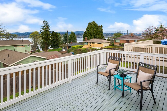Building Photo - Water Views| Expansive Deck | Flexible Living Spaces