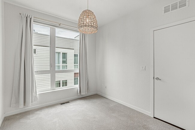 Building Photo - Modern 2BD, 3BA RiNo Townhome with Garage and Rooftop Deck