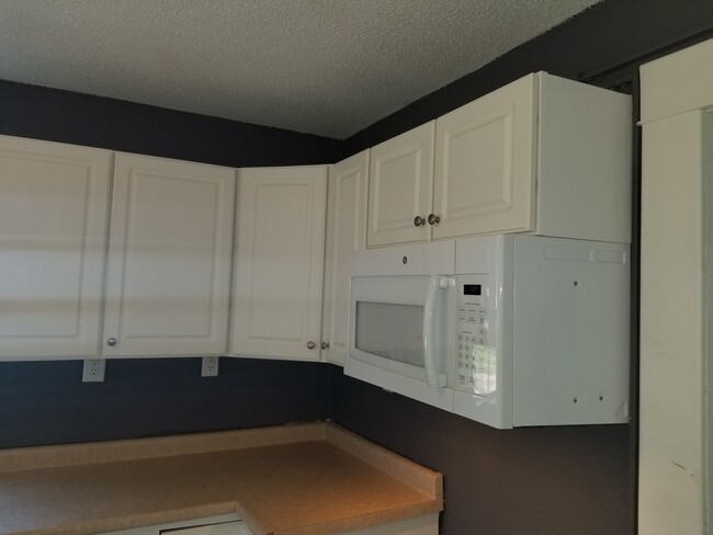 Overhead cabinets - 202 10th St